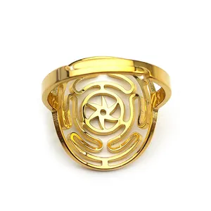 Golden stainless steel geometric openwork ring featuring a unique sunburst maze design