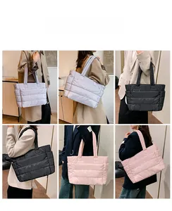 Quilted puffer tote bags in black, grey, and pink shown from multiple side angles