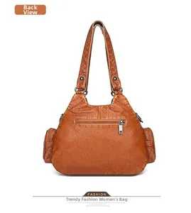 Vista posteriore della borsa a tracolla retrò marrone in similpelle con tasche con zip