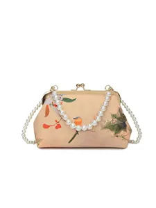 Vintage floral bird print clutch bag with large pearl handle and gold metal clasp