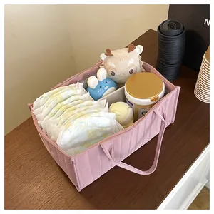 Pink quilted baby diaper caddy organizer with multi-compartments for storage