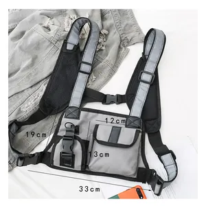 Detailed size measurement of reflective tactical chest bag showing dimensions 33cm by 19cm
