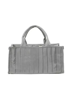 Minimalist grey quilted tote bag with vertical stripes for commuting and storage