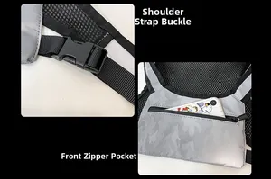 Detail view of adjustable shoulder strap buckle and front zipper pocket on camo tactical vest