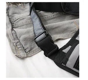 Detail of high-density nylon strap with quick-release plastic buckle and reflective trim