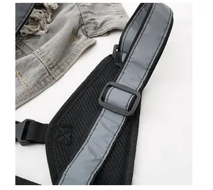 Close-up of reflective fabric, breathable mesh straps, and durable plastic tactical buckles