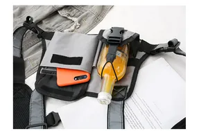 Top view of tactical chest bag showing pockets for phone and bottle with mesh back