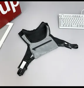Close-up of tactical chest bag showing breathable mesh and gray reflective fabric detail