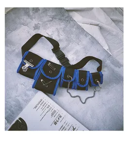 Detail of hip hop chest bag with blue piping, metal chains and mesh multi-pocket design