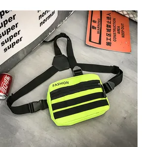 Detail view of neon green tactical chest bag with adjustable Y-shaped straps and buckles