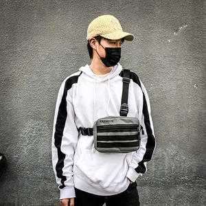 Waterproof charcoal grey crossbody chest bag for men featuring adjustable strap and fashion logo
