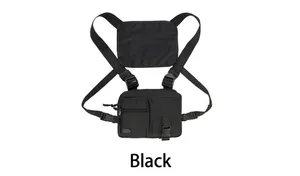 Detail view of black tactical chest bag with adjustable straps and multi-pocket design