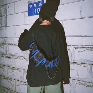 Hip hop tactical chest bag with black mesh and blue trim featuring metallic chains