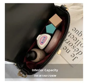Internal capacity of black quilted bucket bag with red lining for daily essentials