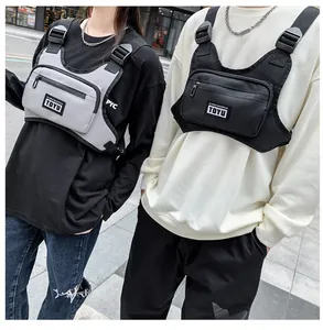 Streetwear tactical chest bags in grey and black with adjustable straps and front zip pockets