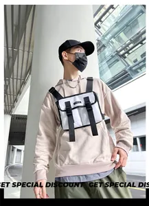 White tactical chest bag with adjustable black straps and buckle closures shown on model