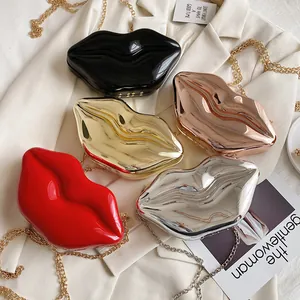 Glossy lip-shaped patent leather clutch bags in various colors with metal chains