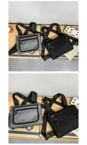Détail de sacs de poitrine tactiques en tissu oxford uni avec poches zippées doubles