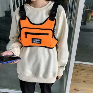 Tactical orange chest rig bag with adjustable black straps and dual zipper pockets