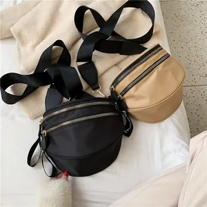Minimalist nylon crossbody chest bag with double zippers in black and khaki colors