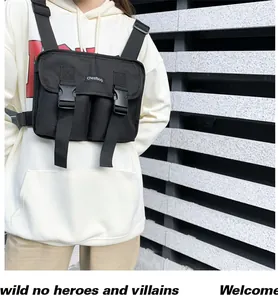 Close-up of tactical chest bag with dual buckle pockets and adjustable nylon straps