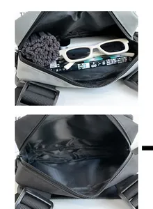 Detailed view of the large capacity interior of the sporty nylon crossbody chest bag