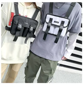 Tactical chest rig detail featuring adjustable straps and dual-pocket nylon construction