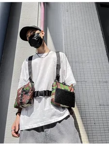 Tactical chest bag with jungle camo dual pouches and breathable mesh pocket detail