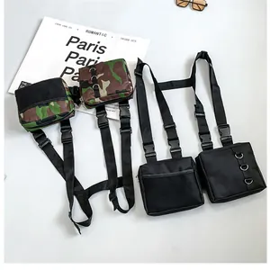 Detailed view of tactical chest rig with dual pockets and adjustable nylon mesh straps