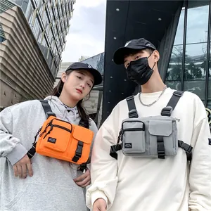Multi-functional street style tactical chest bag in vibrant orange and sleek light grey