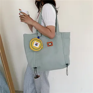 Cute green large capacity canvas shoulder bag for women with small floral purse accessory