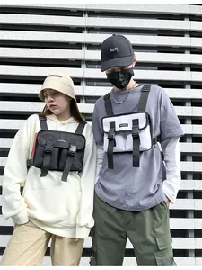 Close-up of tactical chest bags with durable nylon fabric and adjustable utility straps