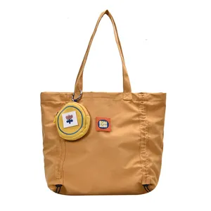 Cute khaki canvas tote bag with floral coin purse and adjustable side drawstrings