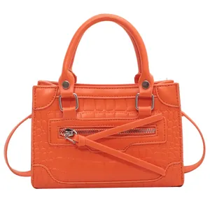 Bright orange crocodile embossed PU leather handbag with long shoulder strap and zipper