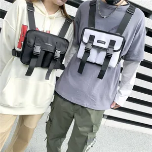 Tactical chest bag with adjustable straps and buckles in black and white street style