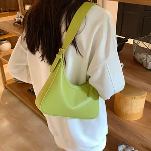 Minimalist avocado green PU leather half-moon underarm bag with adjustable strap