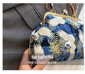 Detail view of Chinese vintage crane print bag with bamboo handle and golden chain