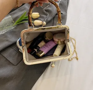 Detail view of the spacious interior of this crane print bag with bamboo handle