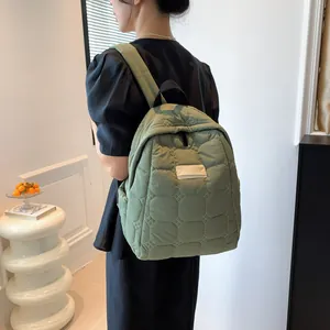 Quilted matcha green nylon backpack for women with check patterns and zip closure