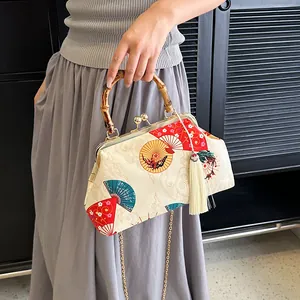 Retro handtas met kraanvogel-waaierprint, bamboe handvat en elegante zijden kwastje