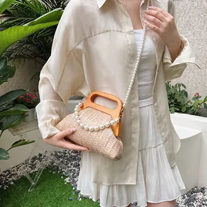 Exquisite woven handbag with wooden handle and pearl chain strap for summer style