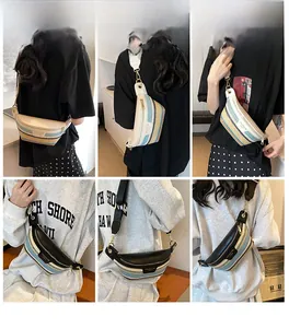 Detail of woven straw crossbody bag featuring colorful stripes and leather trim accents