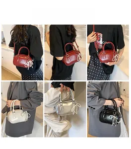Mini bowling bag in various colors shown with pearl bow charm on model outfits
