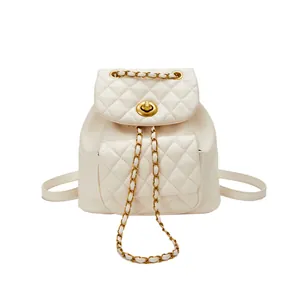 Chic cream quilted backpack with gold chain straps and turn-lock bucket bag design