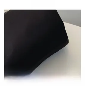 Detailed close-up of smooth black matte fabric texture showing the comfortable material