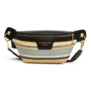Contrast woven crossbody chest bag with colorful wave patterns and black leather top
