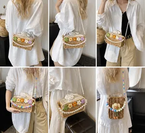 Detailed views of handmade woven straw crossbody bag with floral accents and pearl strap