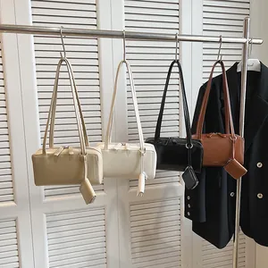 Minimalist square shoulder bag set in four colors with matching zipper pouch