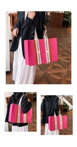 Macro view of bright fuchsia felt tote bag showing durable woven straps and room space