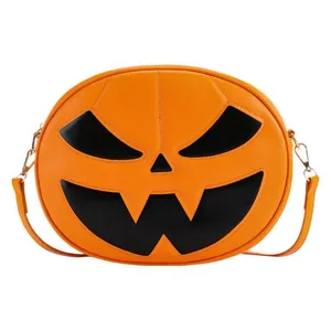 Vibrant orange pumpkin crossbody bag with black jack-o'-lantern face for Halloween